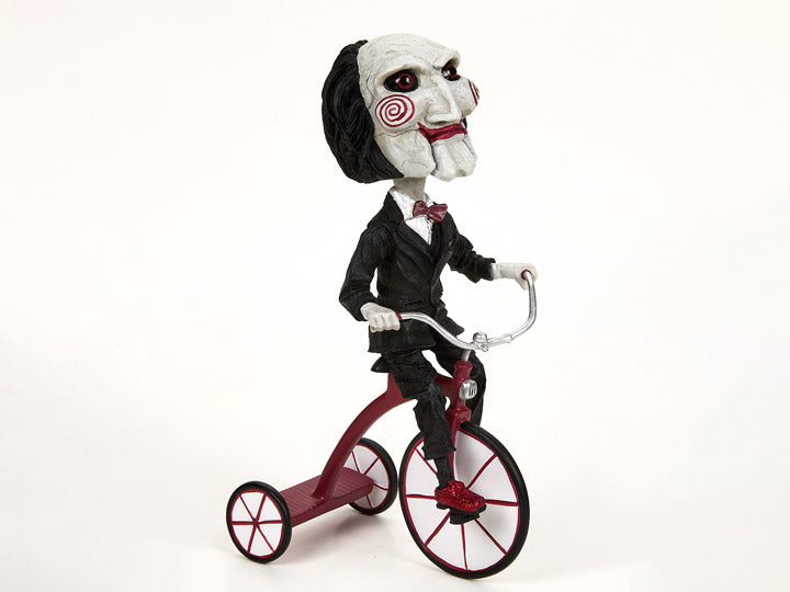 Saw: Billy the Puppet on Tricycle Head Knocker